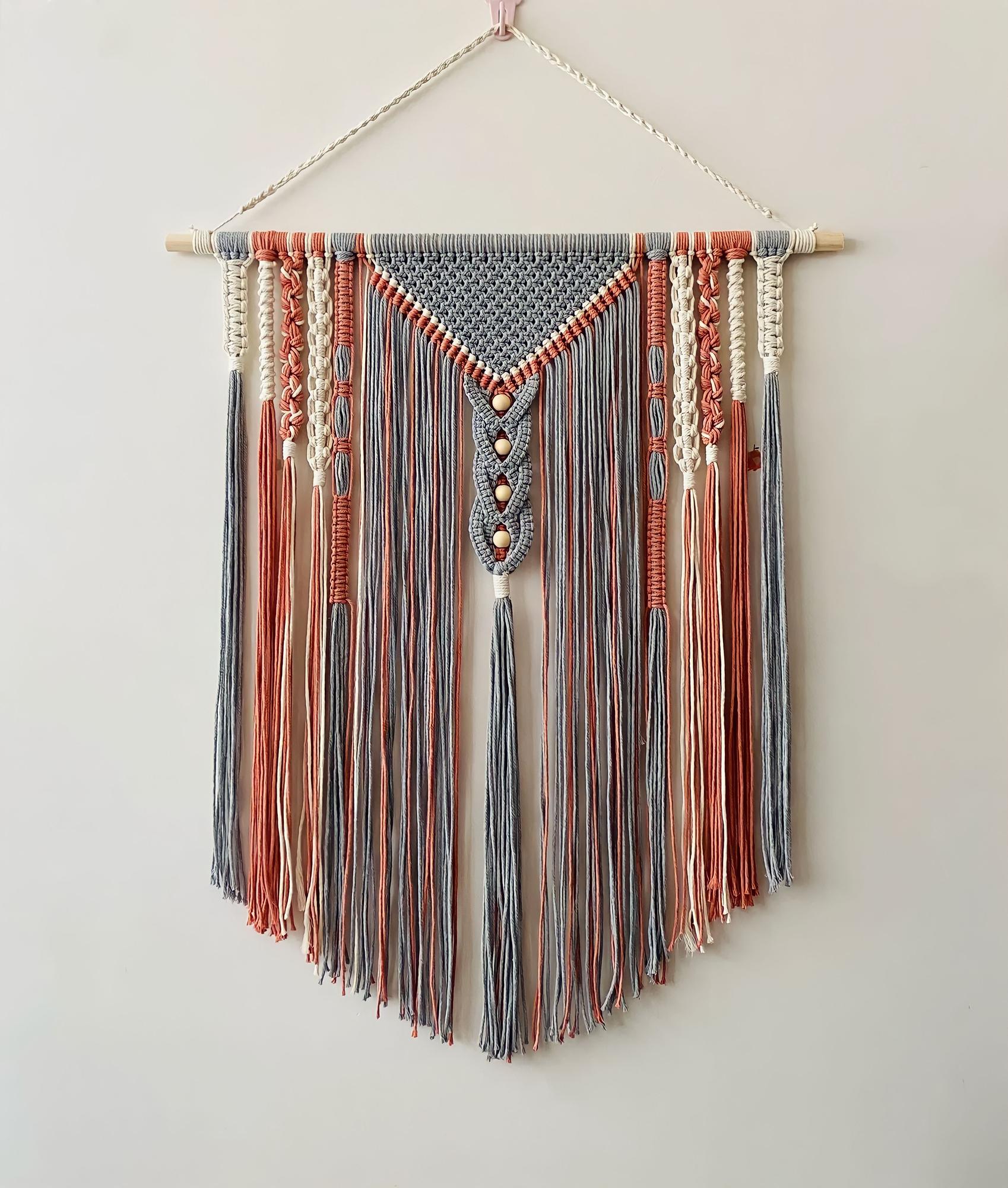 atelier doorway with hanging embroidered textiles